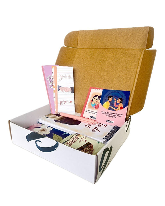 Papboo Raksha Bandhan Hamper For Sister With 1 Brownie Bar, 1 Hardcover Diary, 1 To DO list, 1 Pen, 5 Bookmark, 2 Rakhi Cards